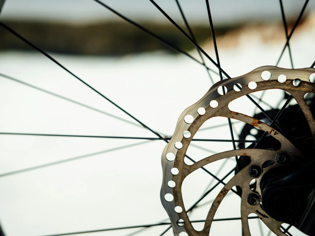 Brake disc on a wheel with spokes